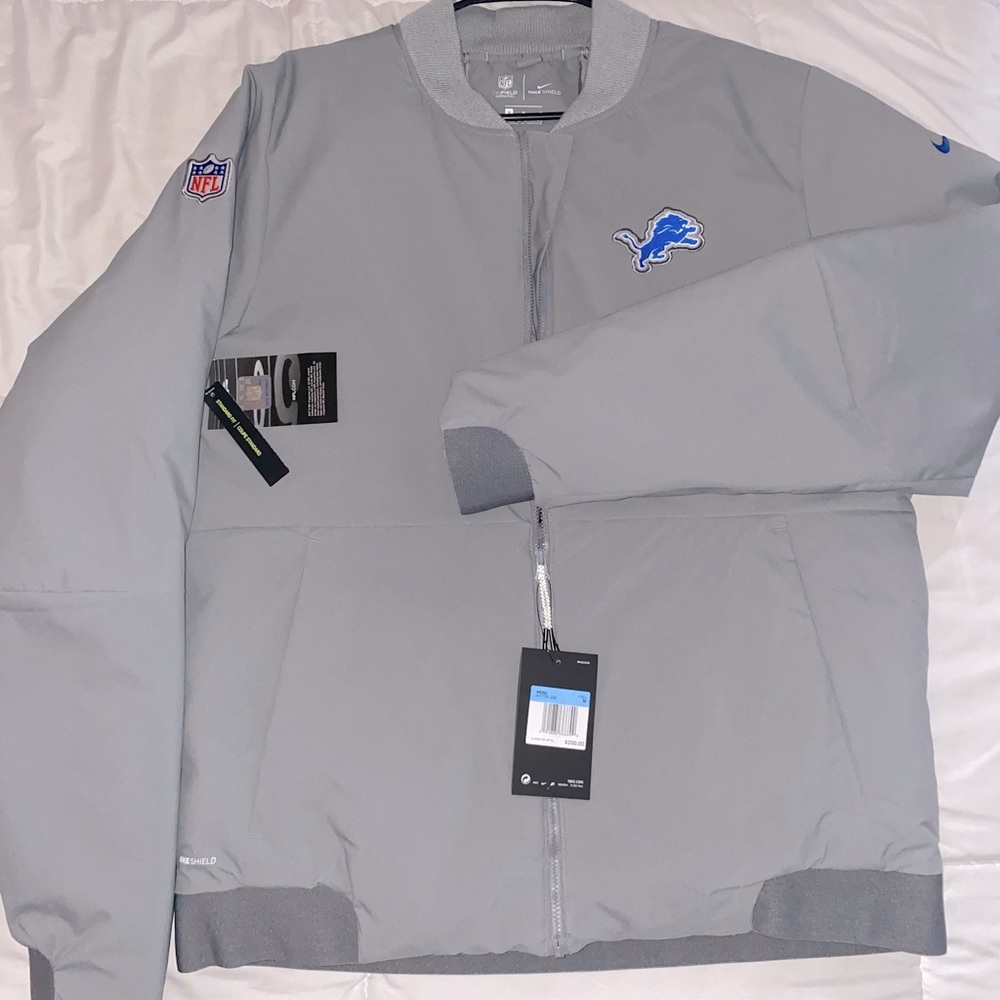 NIKE SHIELD DETROIT LIONS ON FIELD BOMBER JACKET MEN MEDIUM